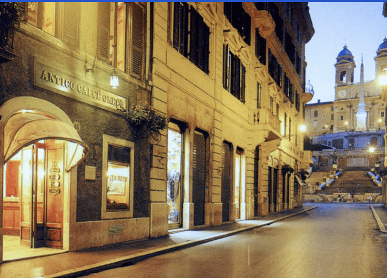 Antico Caffè Greco brick storefront in Italy.